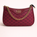 Trendy brown shoulder bag with gold chain, perfect for party wear